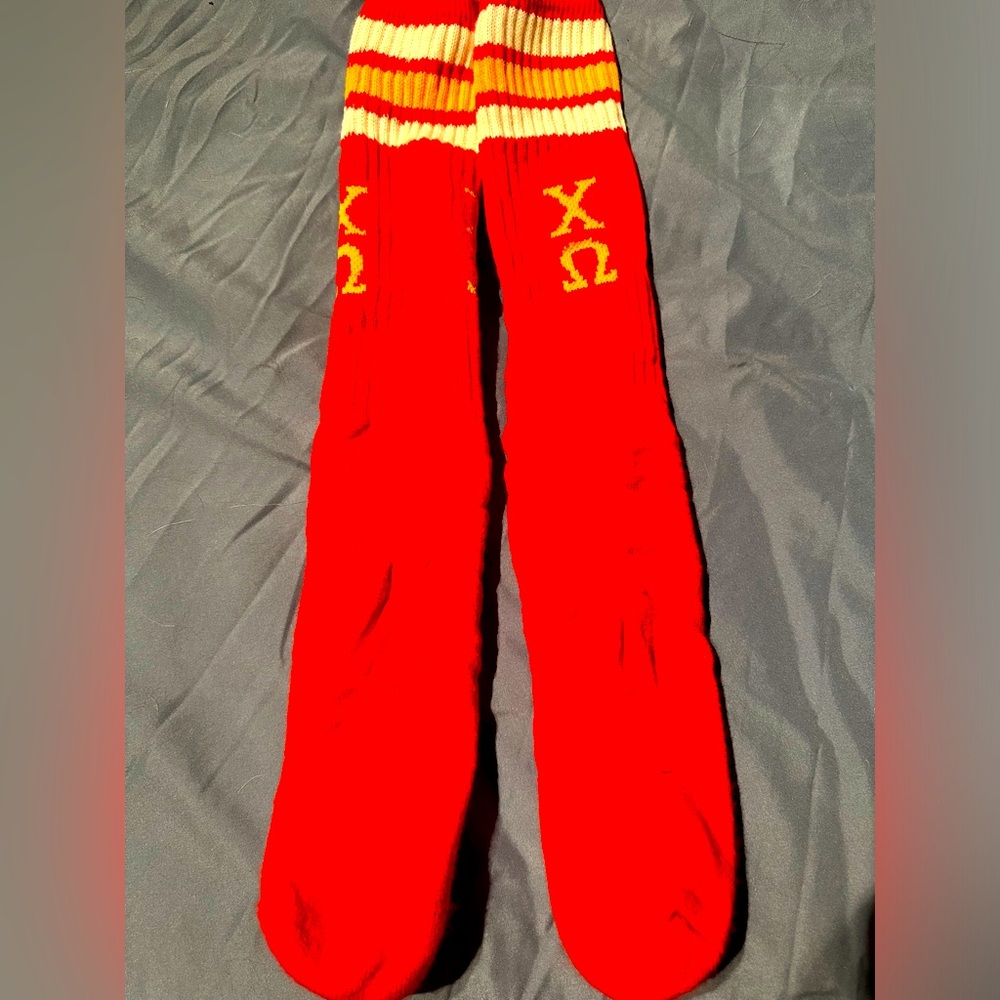 Red and Yellow Chi Omega sorority knee high socks .  Like new